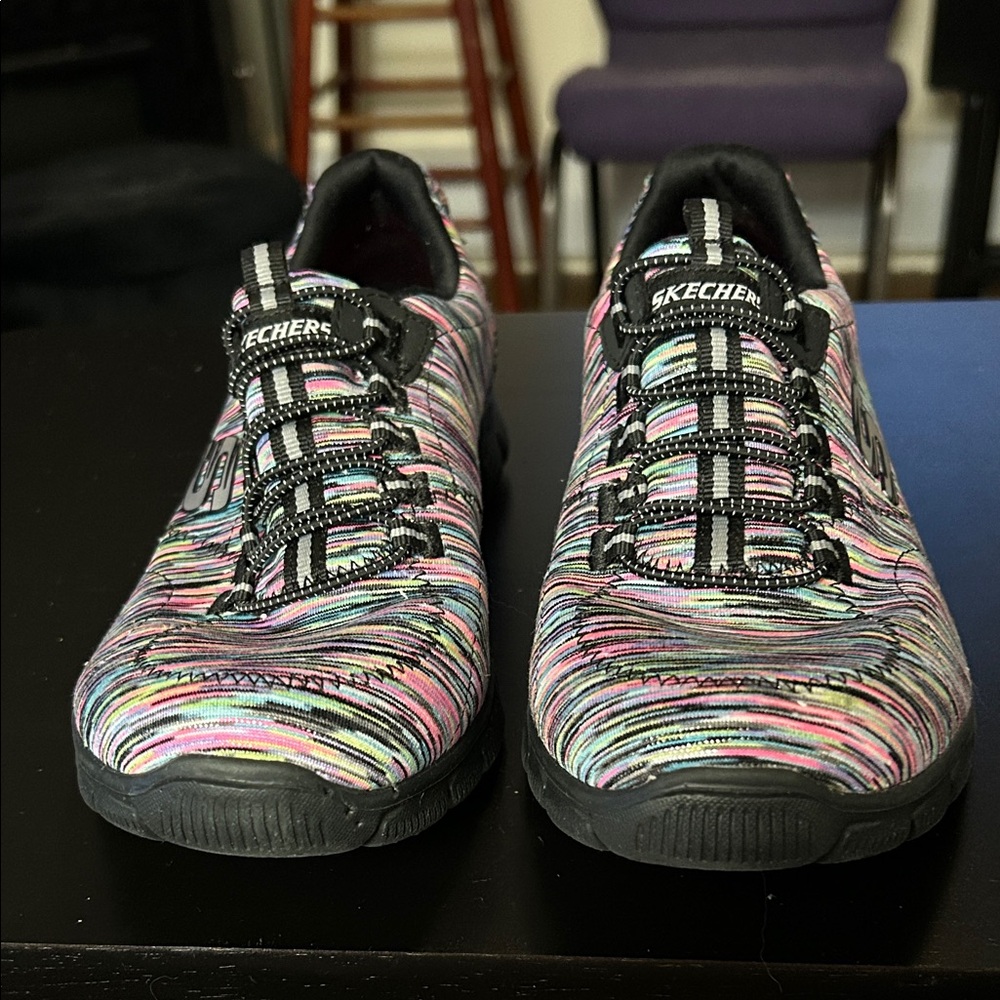 Never worn, but gently loved by my cat (see photos) Skechers size 8 Multi Color